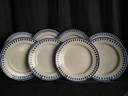 Série de 8 assiettes plates en porcelaine de Tournai décor aux glands 