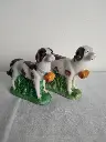 Paire de chiens Saint-Bernard en porcelaine XIXe siècle décor main 