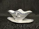 Saucière en porcelaine de Paris décor bleu et rehaut or XIXe siècle 