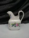 Petit pot à lait en porcelaine de Paris XIXe siècle décor de fleurs fait main