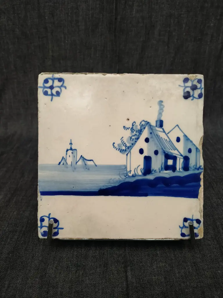 Carreau en faïence de Delft datant du XVIIIe siècle décor bleu 