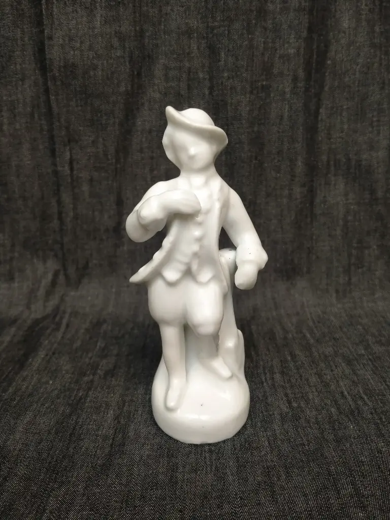 Encrier en porcelaine XIXe siècle représentant un gentilhomme 