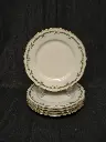 Ensemble de 5 assiettes en porcelaine de Limoges décor imprimé de feuilles de Laurier et rehaut or