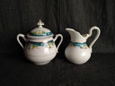 Ensemble sucrier et pot à lait porcelaine de Paris décor bleu et fleurs XIXe siècle