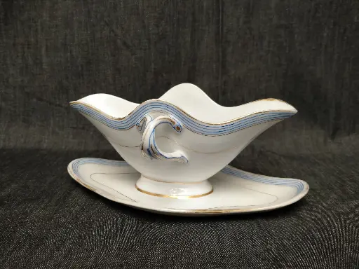 [26013] Saucière en porcelaine de Paris décor bleu et rehaut or XIXe siècle 