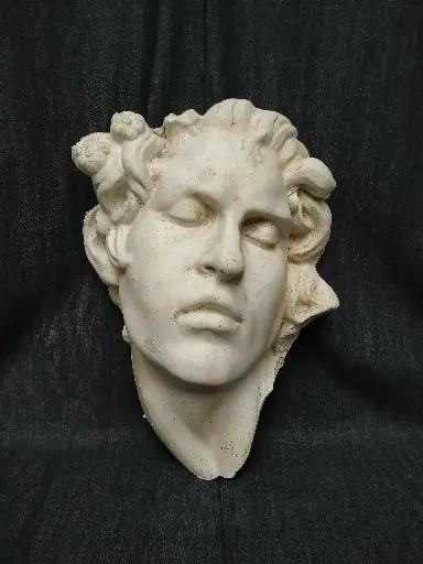 [26089] Sculpture représentant le visage du Faune endormi ou Faune Barberini en platre 