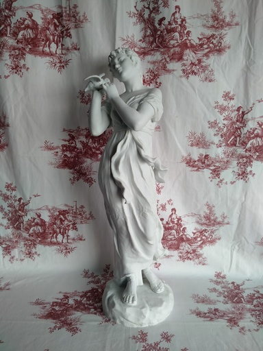[24050] Sculpture en biscuit "La jeune fille à la colombe" signée Ferville